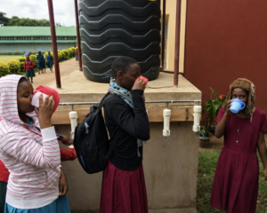 Students enjoy safe, clean water from a Purify Project water system in Moshi, Tanzania.